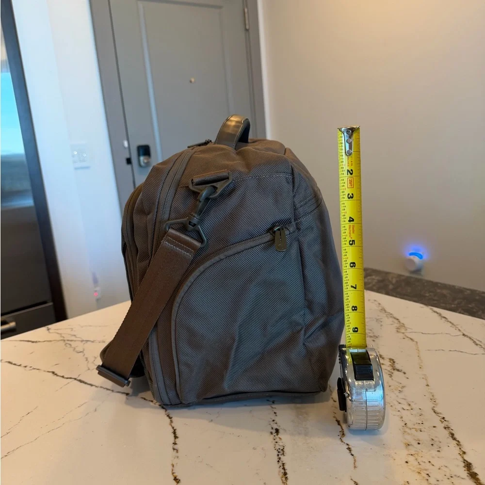 Tumi Brown Backpack with Multiple Compartments